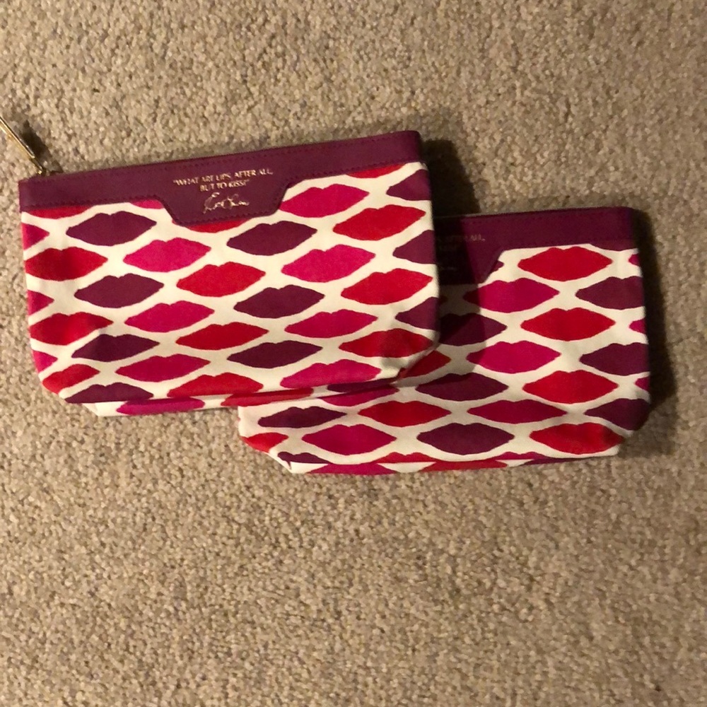 Two Estée Lauder Cosmetic cases